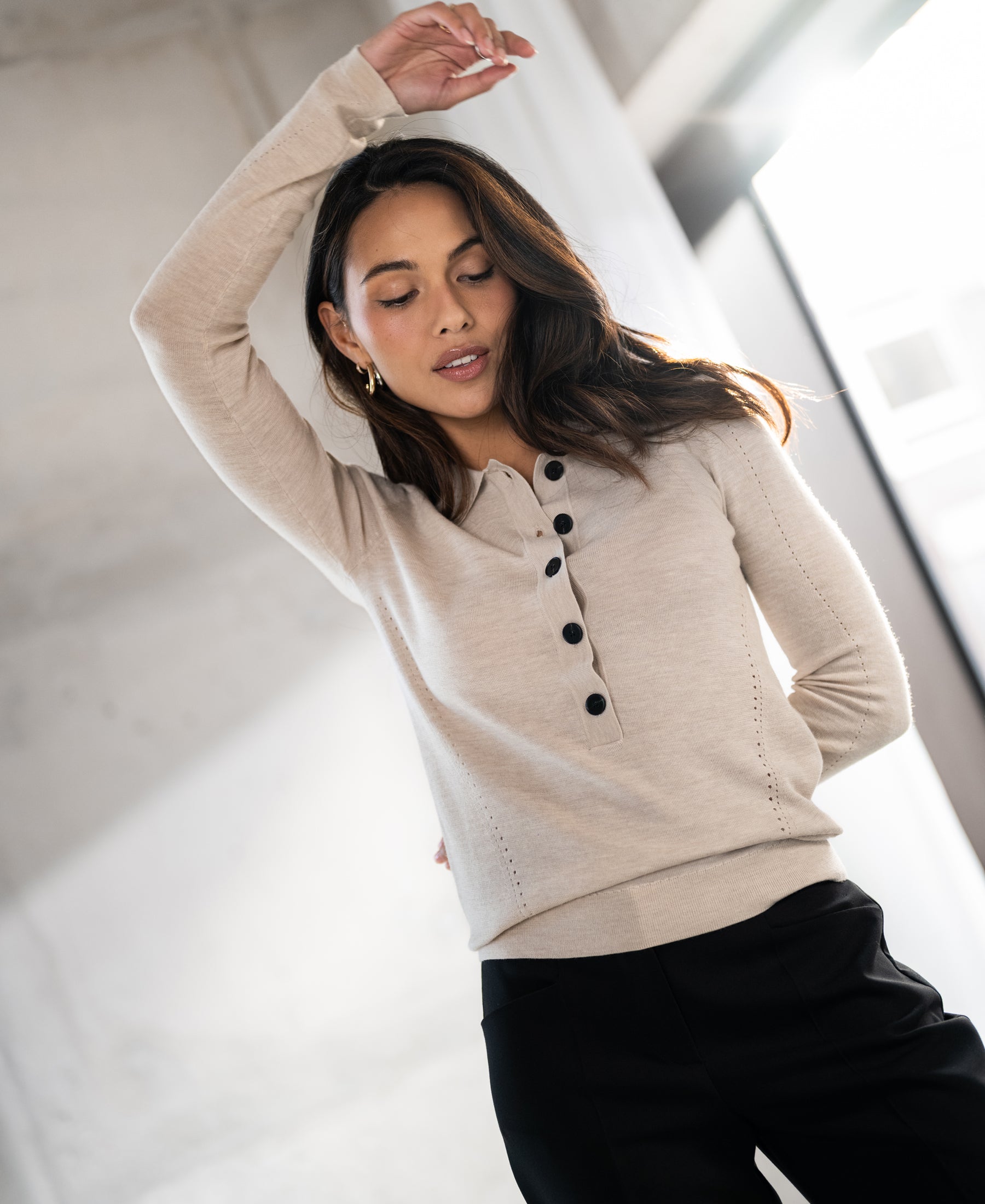 Beige merino wool polo shirt LE BOBIGNY by PLEIN PUBLIQUE shown indoors.
