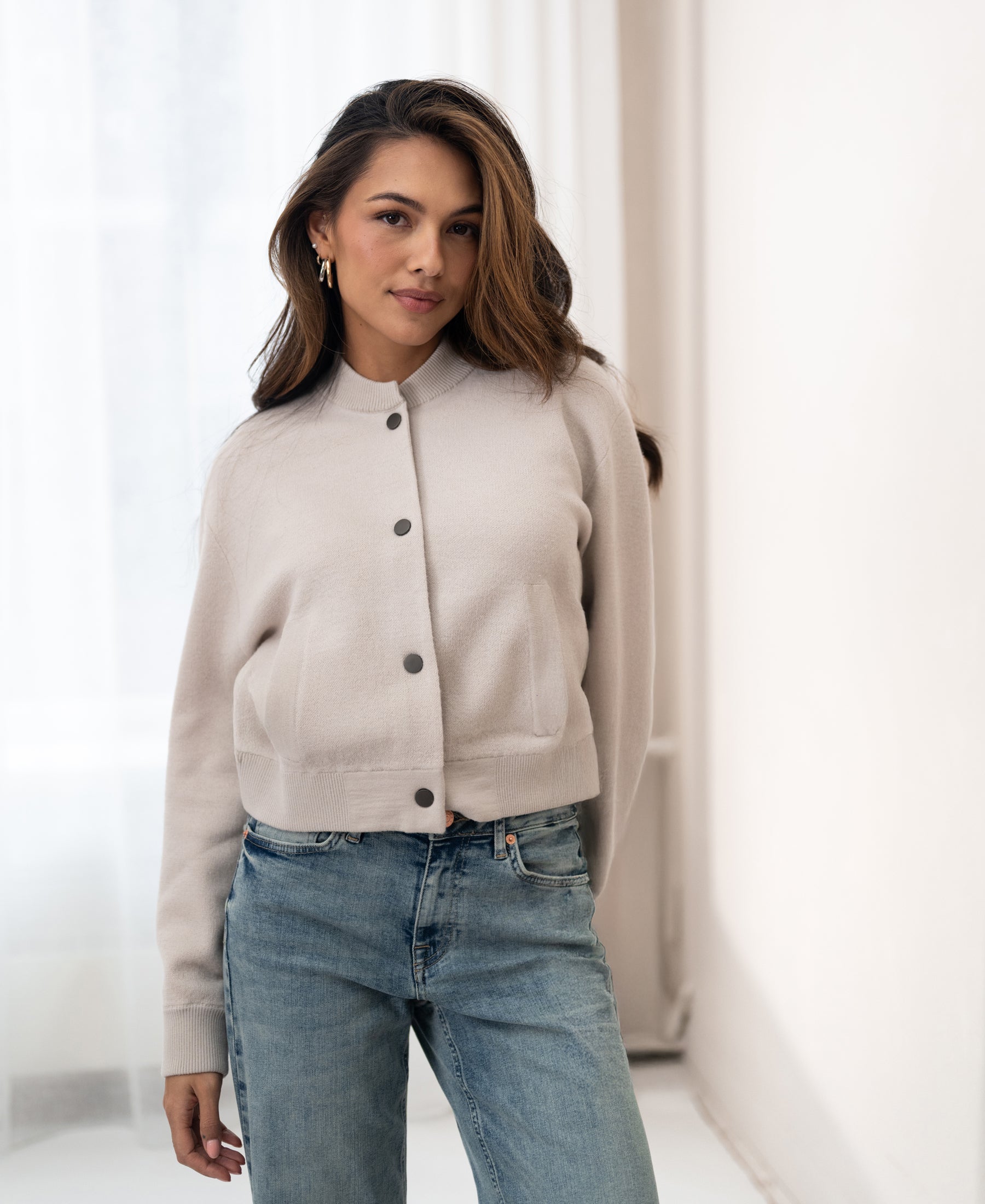 Beige bomber jacket in the style "LA BOMBA" by PLEIN PUBLIQUE shown against a white background.