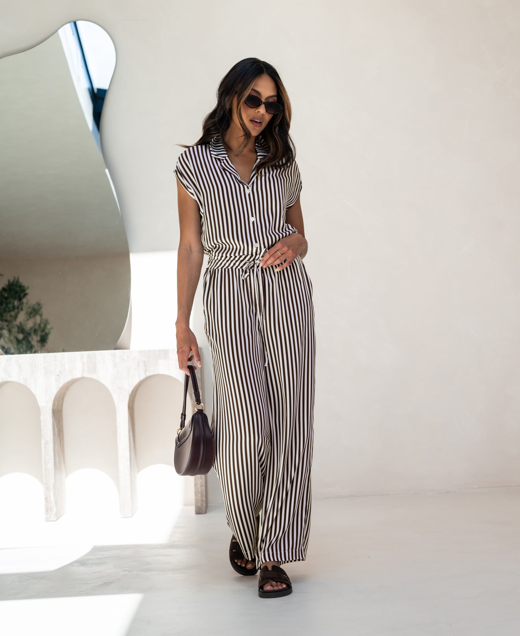 PLEIN PUBLIQUE LA DILOU blouse in ivory-cacao stripes, shown indoors with mirror behind.