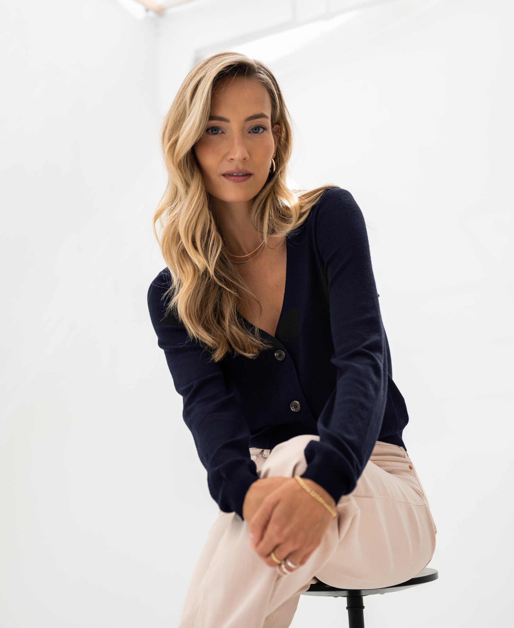 Dark blue PLEIN PUBLIQUE LA DONNA merino wool vest shown against a white background.