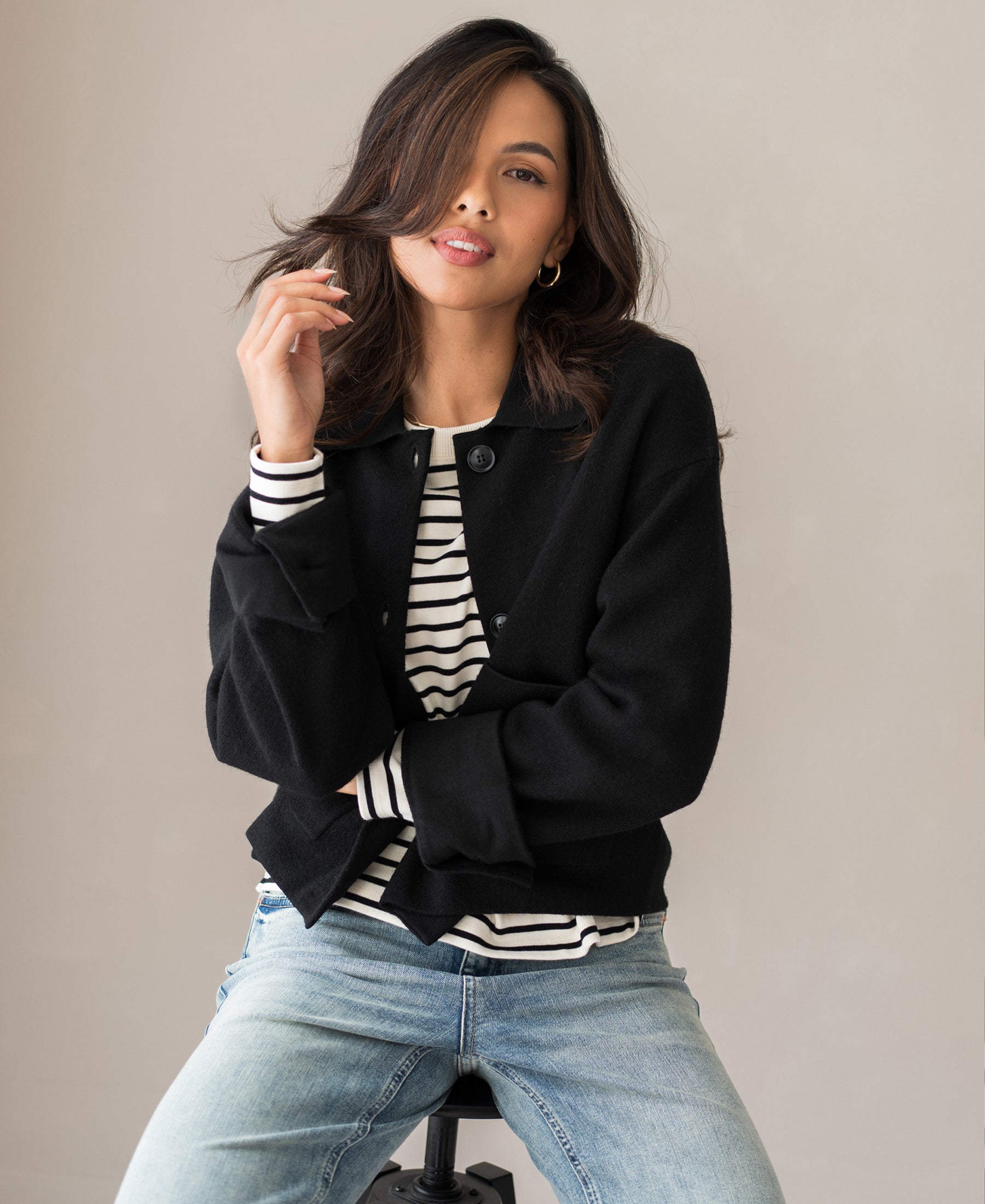 Black wool jacket LA FAYE displayed on a seated woman.