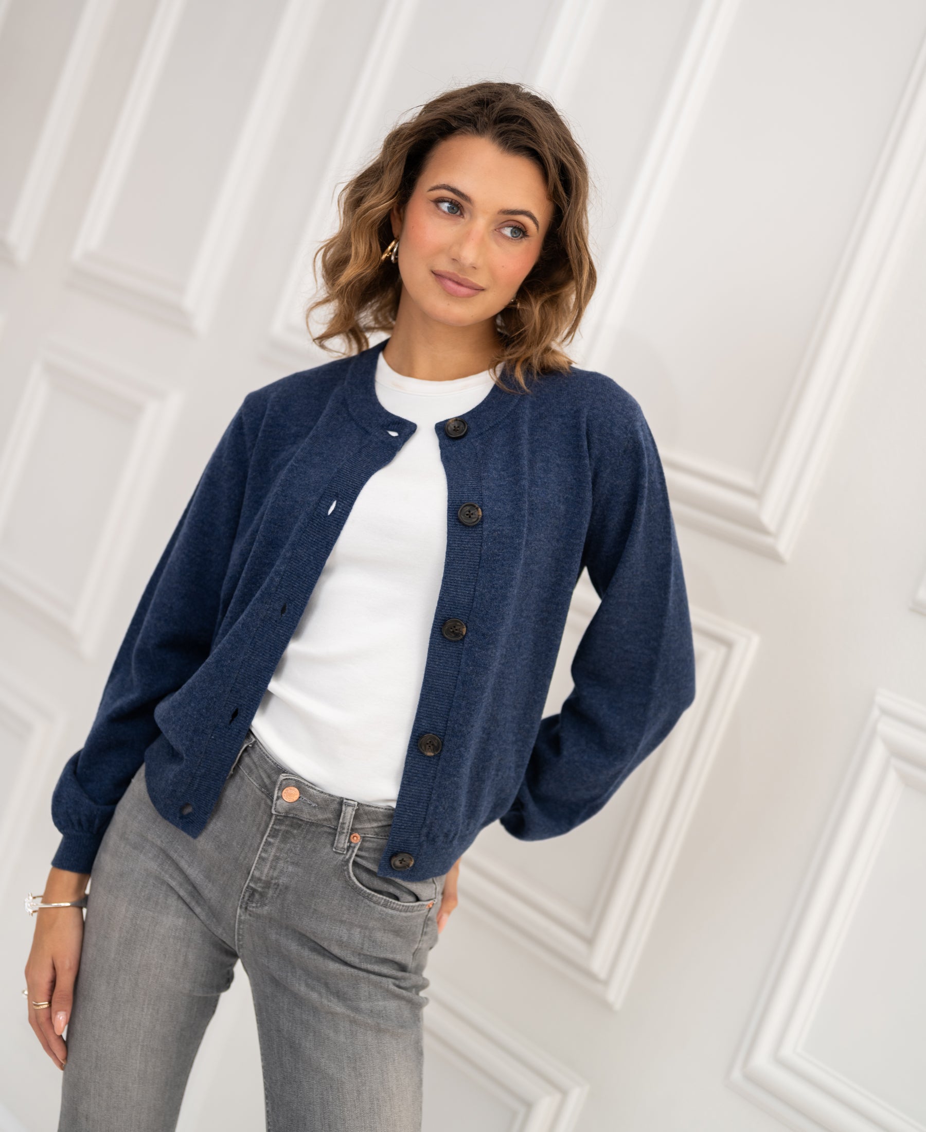 Indigo blue LA LEA crew neck cardigan from PLEIN PUBLIQUE shown against a white background.