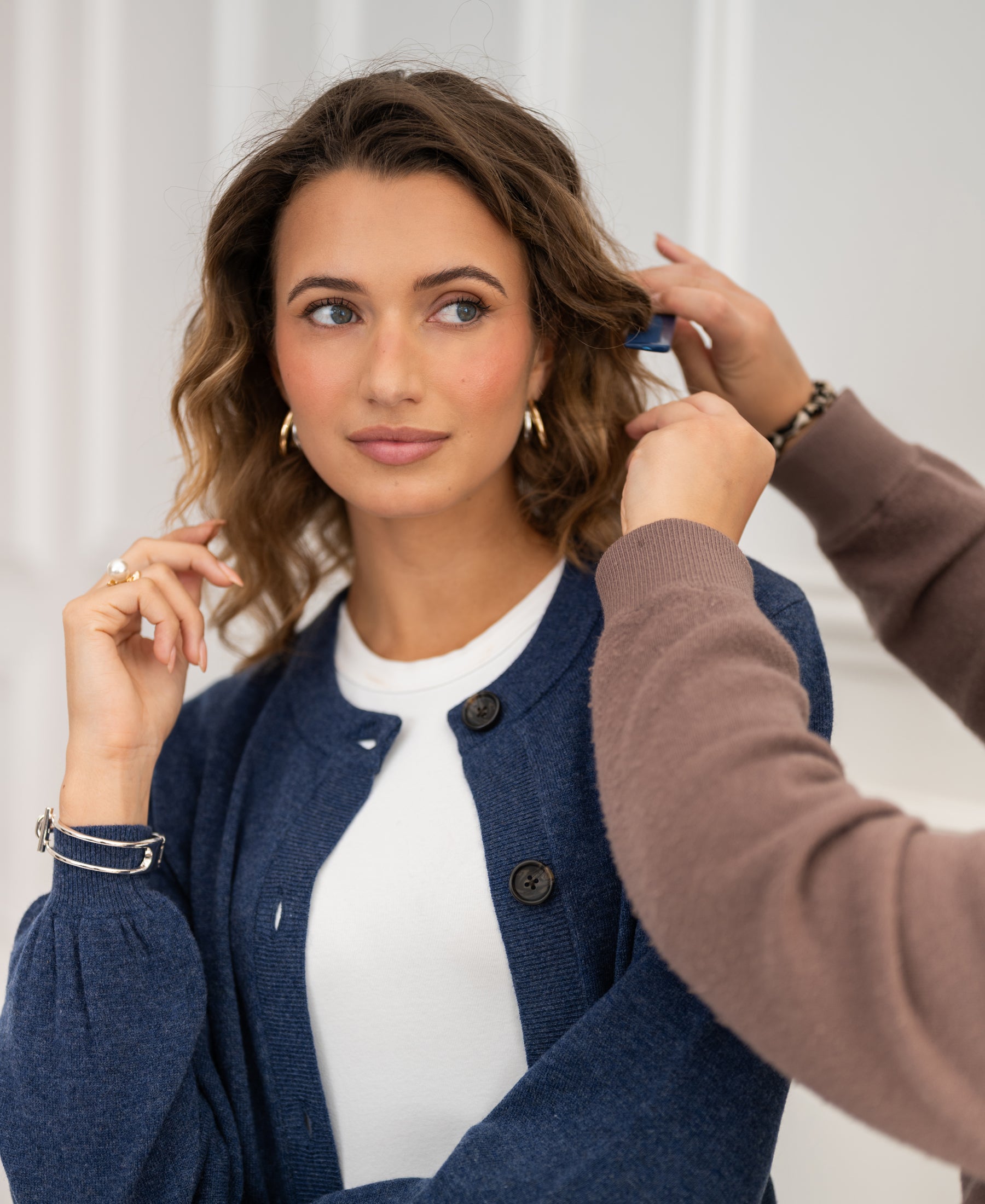 Crew neck cardigan LA LEA in indigo blue by PLEIN PUBLIQUE against a light background.