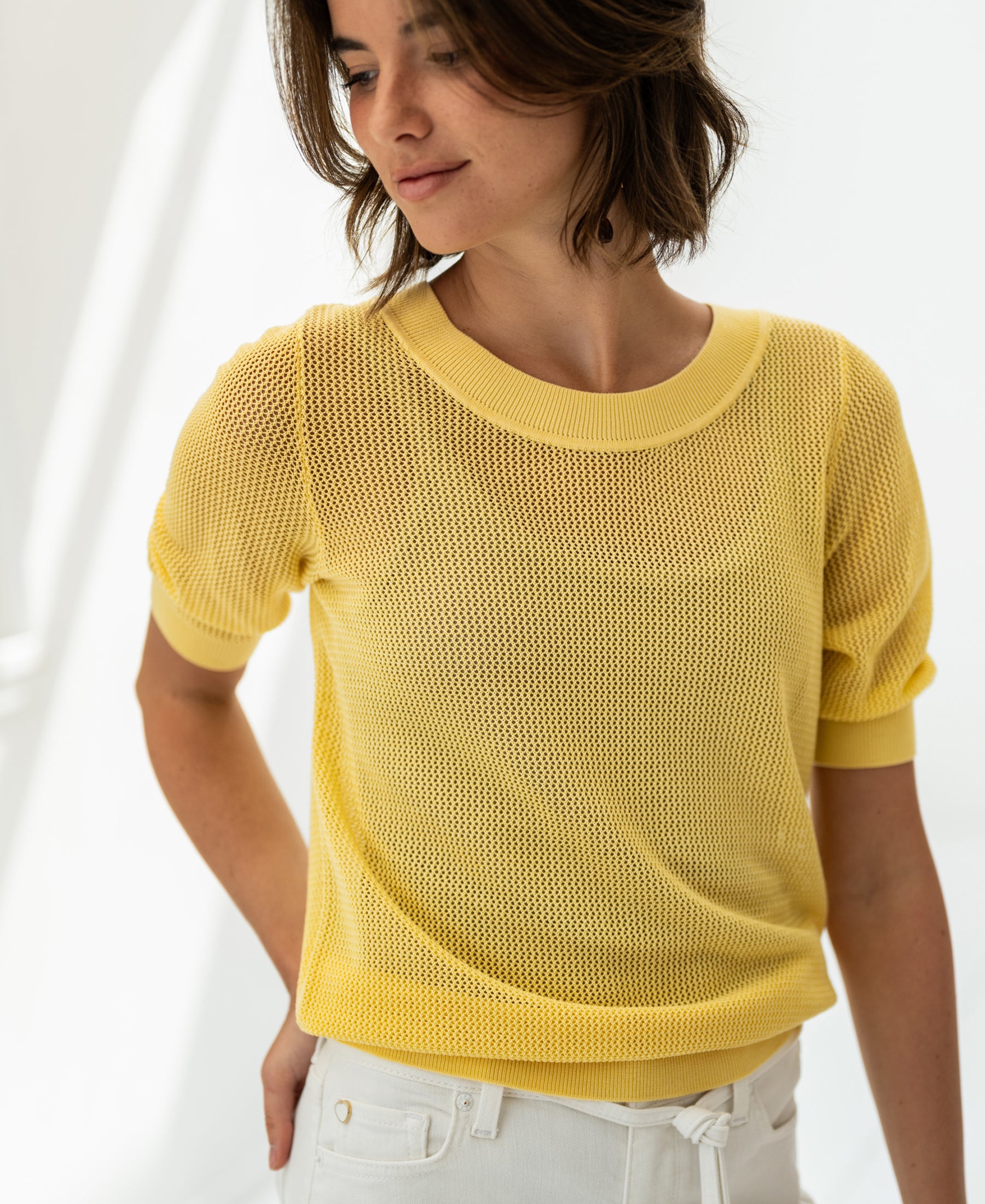 PLEIN PUBLIQUE mesh sweater LE NANCY with silk in Citron pressé, shown in soft bright light.
