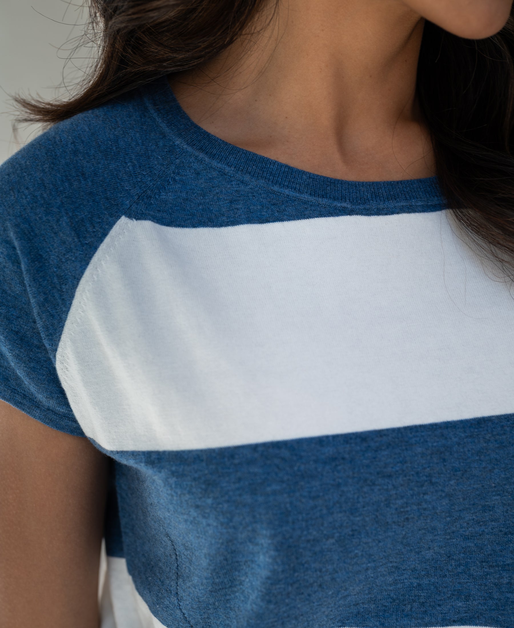 Close-up of the Plein Publique striped sweater La Paloise in denim blue and ivory.