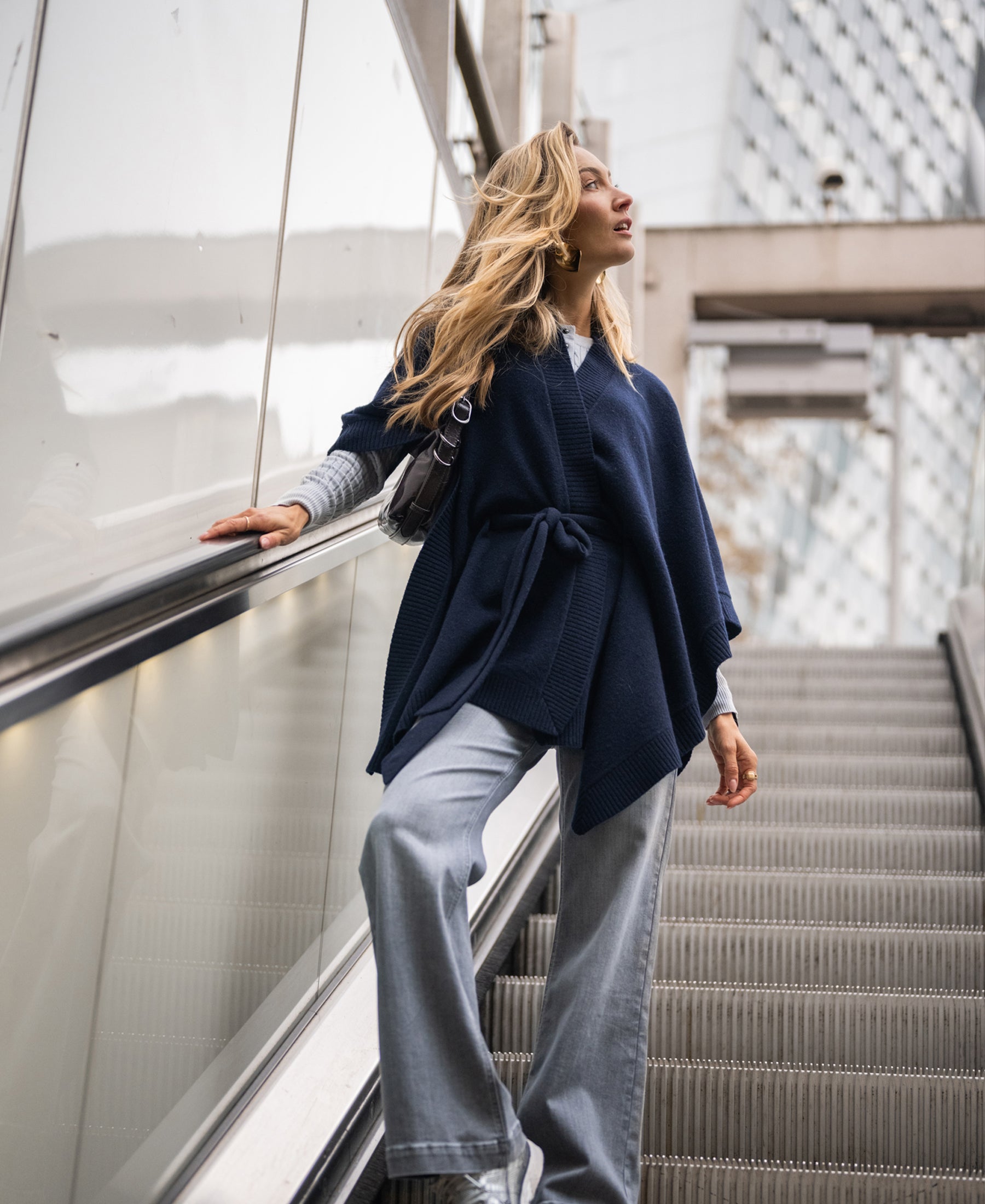 Navy blue merino wool poncho by PLEIN PUBLIQUE.