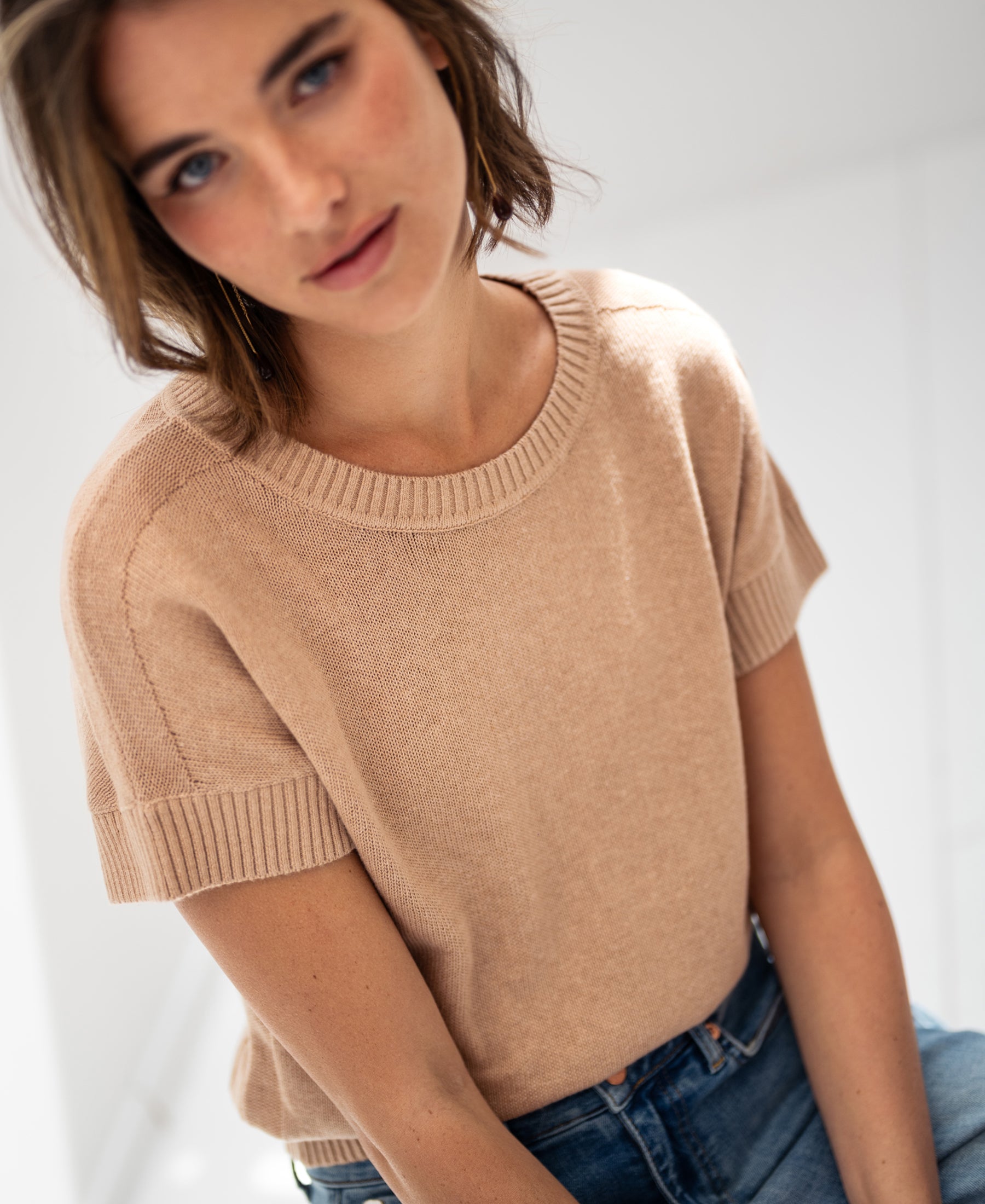 Linen summer sweater LE SOLEIL by PLEIN PUBLIQUE in Soft Camel, shown in soft light.