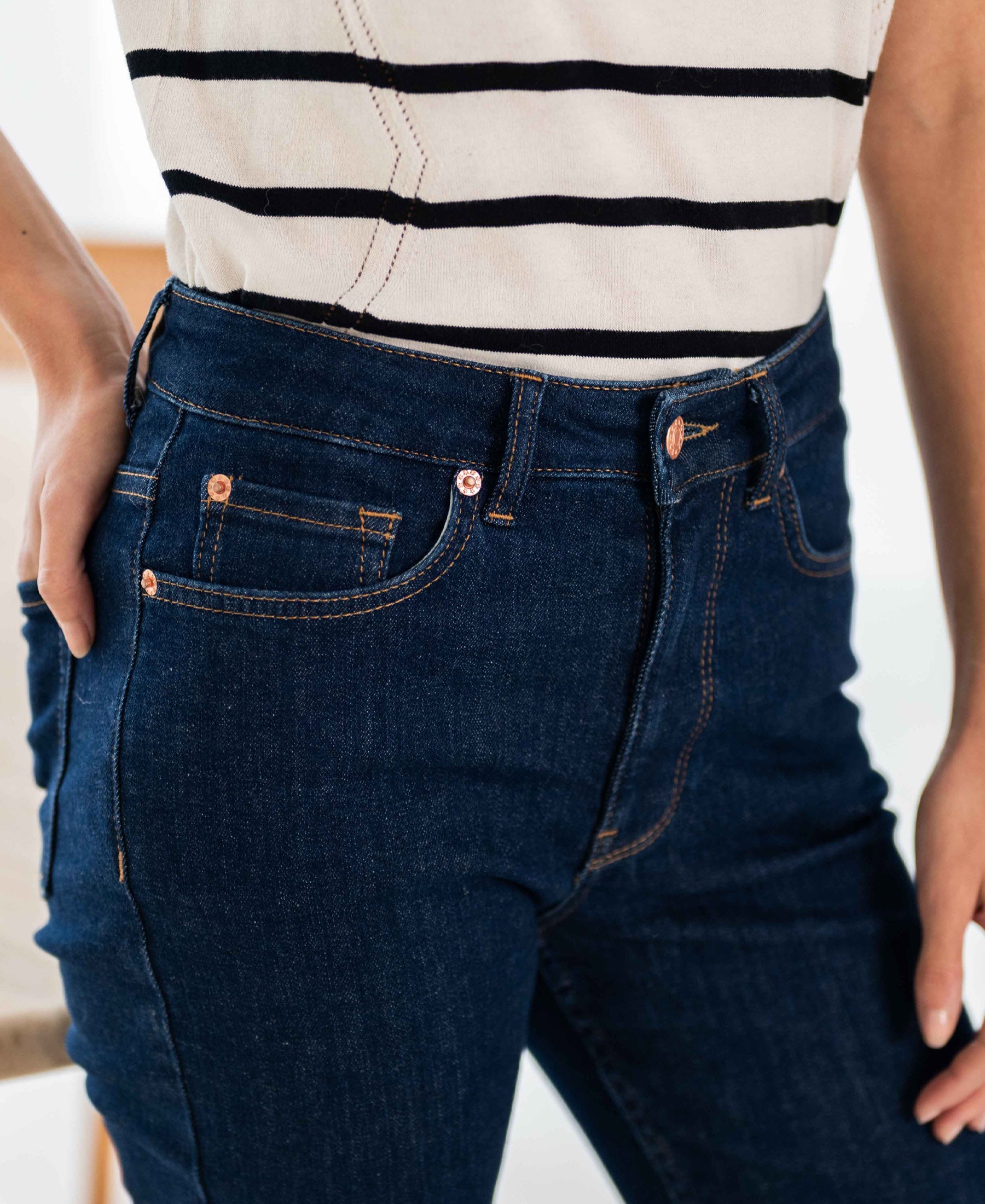 Classic blue stretch denim flared jeans in a rinse wash.