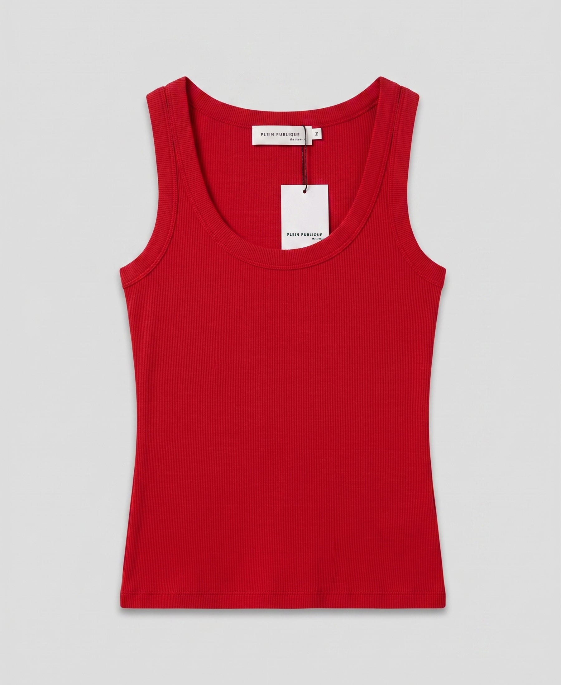 Red slim-fit sleeveless jersey top with scoop neck and white center tag.