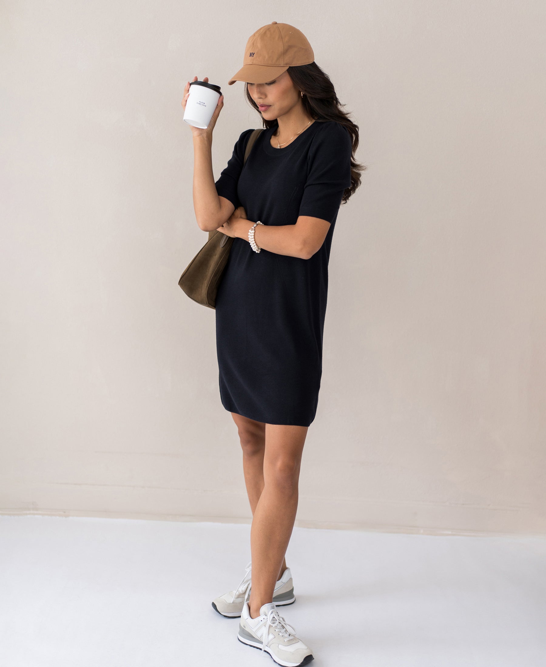 Model in timeless PLEIN PUBLIQUE merino wool dress LA TWIGGY, dark blue.