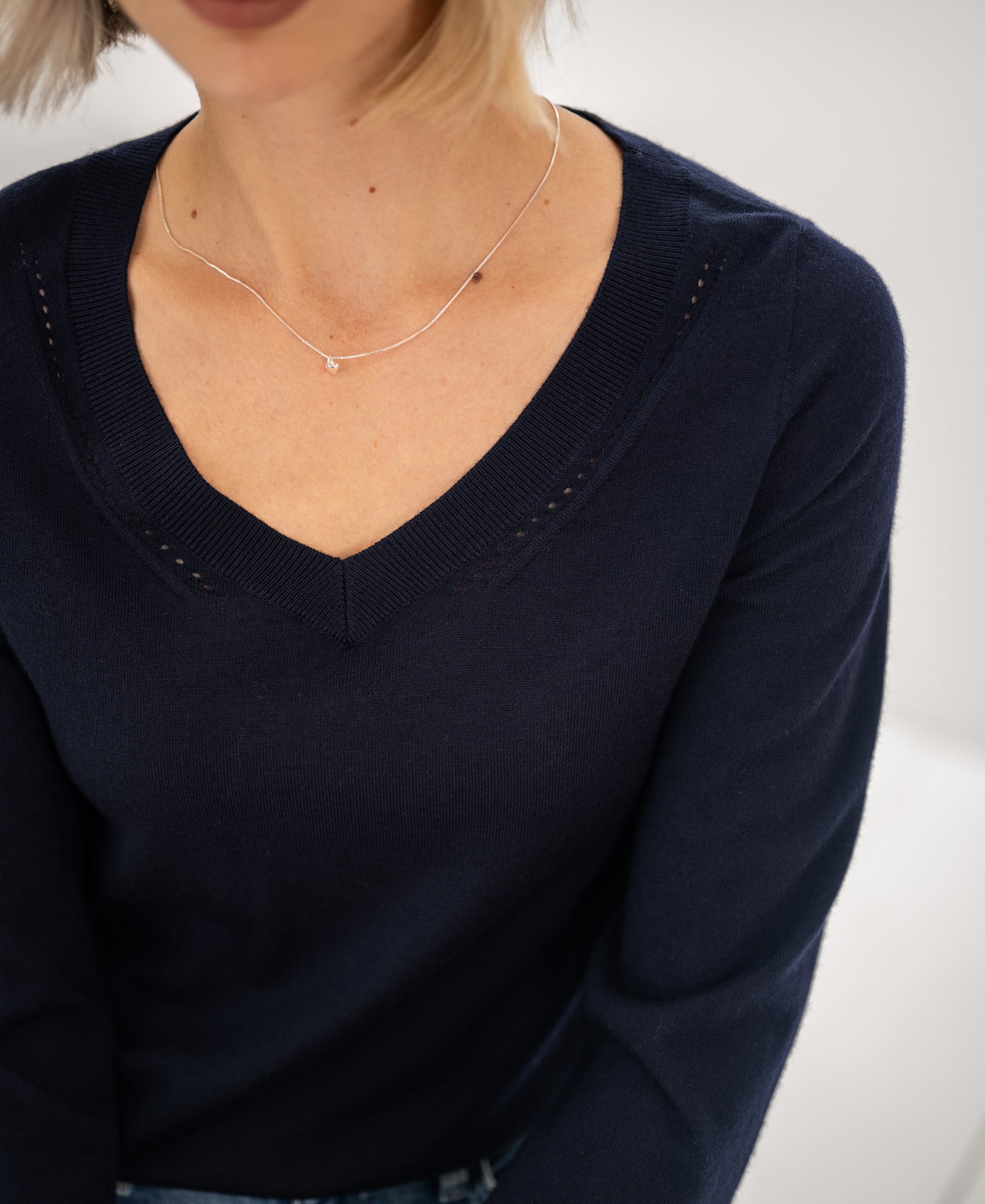 PLEIN PUBLIQUE Merino wool V-neck sweater in dark blue.
