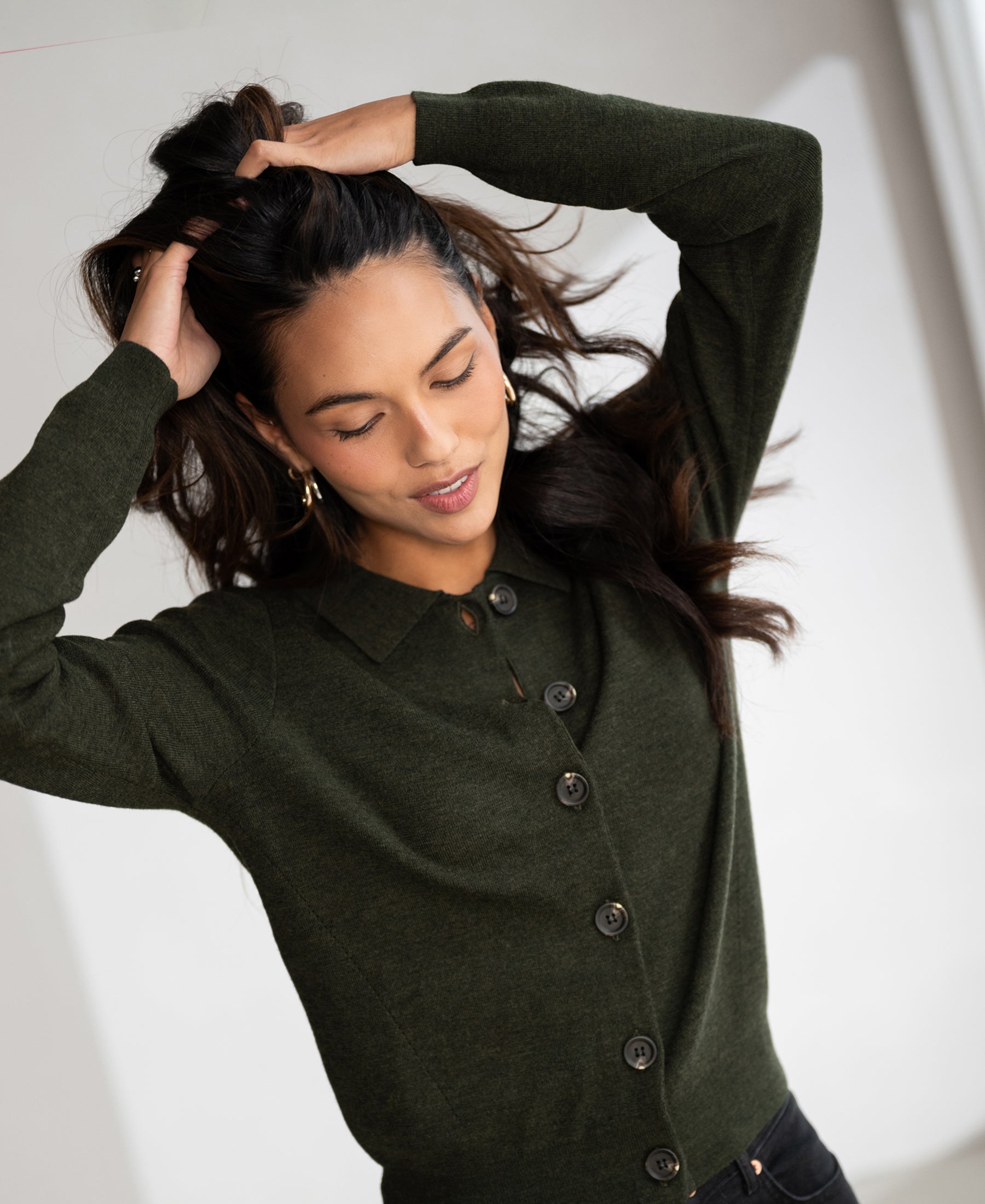 Green polo-collar sweater by Plein Publique, front view.