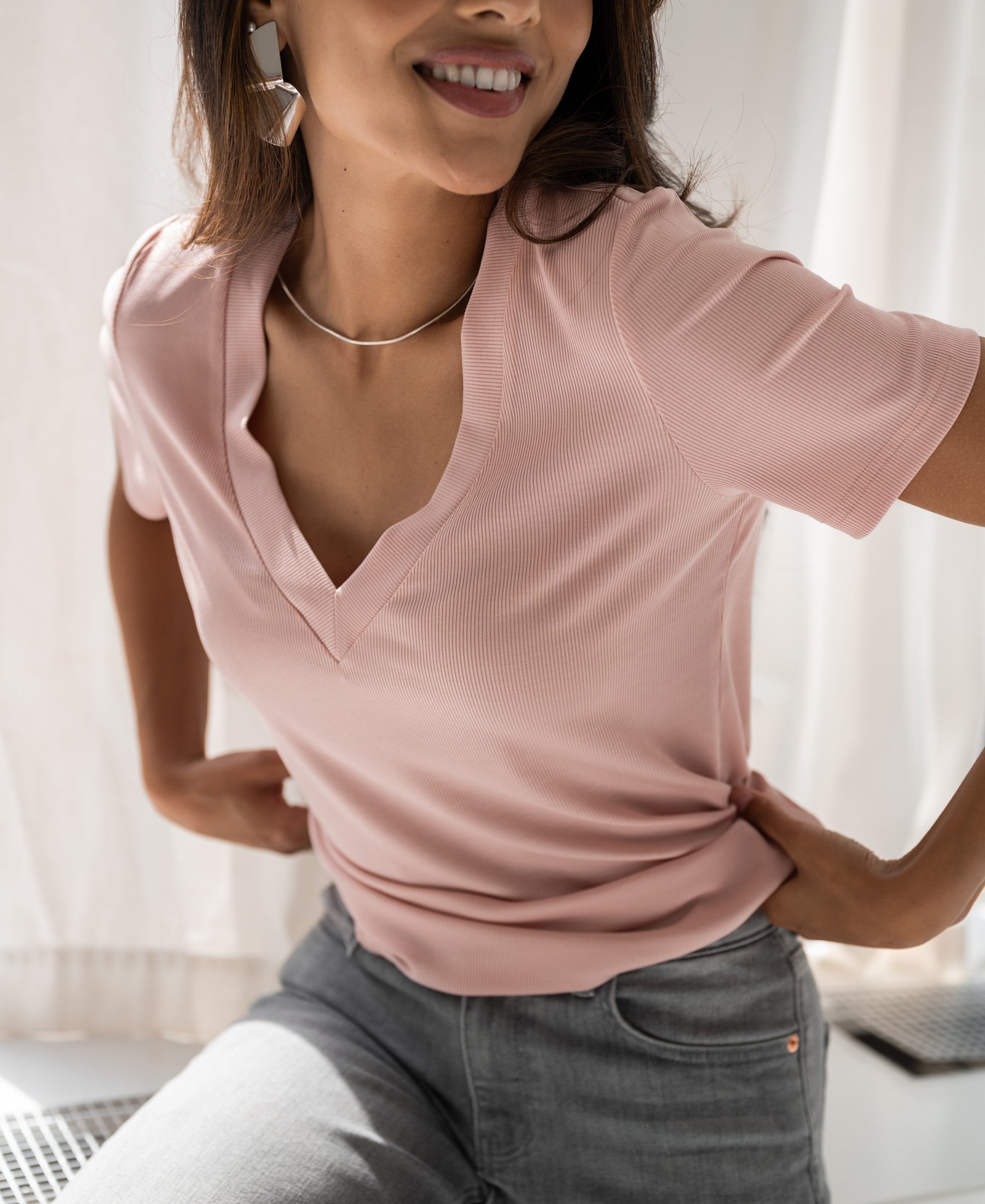Dusty pink women's T-shirt made of lyocell, shown from the front.