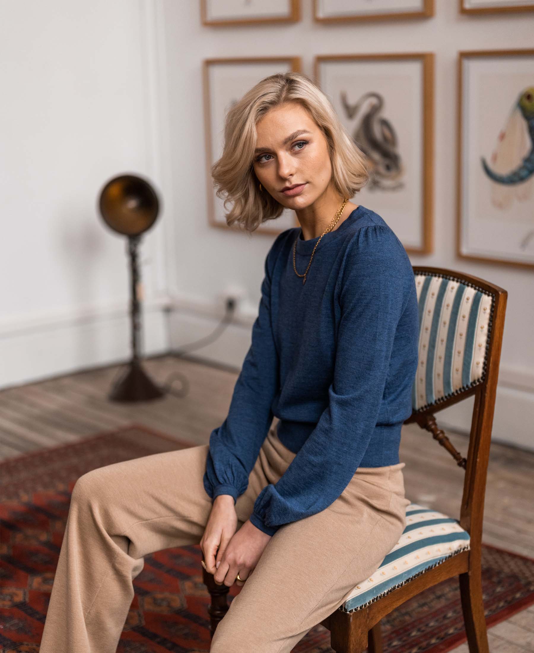 The LA COEUR indigo blue merino wool sweater by PLEIN PUBLIQUE.