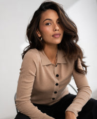 Soft camel merino wool polo shirt in a classic style, shown from the front.
