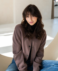 The PLEIN PUBLIQUE LA BOMBA bomber jacket in Innuendo color, shown indoors.