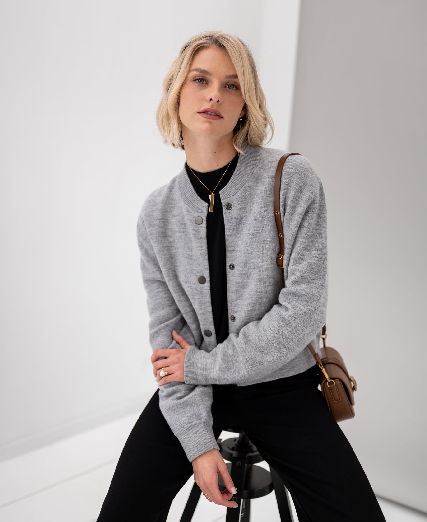 The PLEIN PUBLIQUE LA BOMBA grey melange bomber jacket shown from the front.