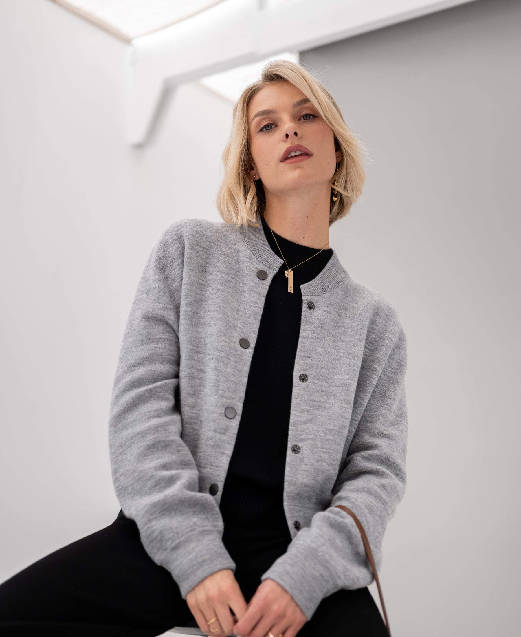 The PLEIN PUBLIQUE LA BOMBA gray melange bomber jacket shown from the front.