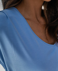 Close-up of the Plein Publique ribbed light blue T-shirt, showing the neckline and fabric texture.