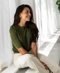Olive green merino sweater from PLEIN PUBLIQUE LA BRIOCHE shown worn by model.