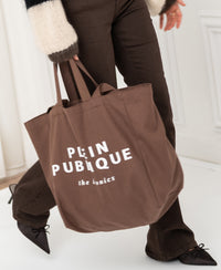 Brown canvas tote bag by PLEIN PUBLIQUE, shown from the front.