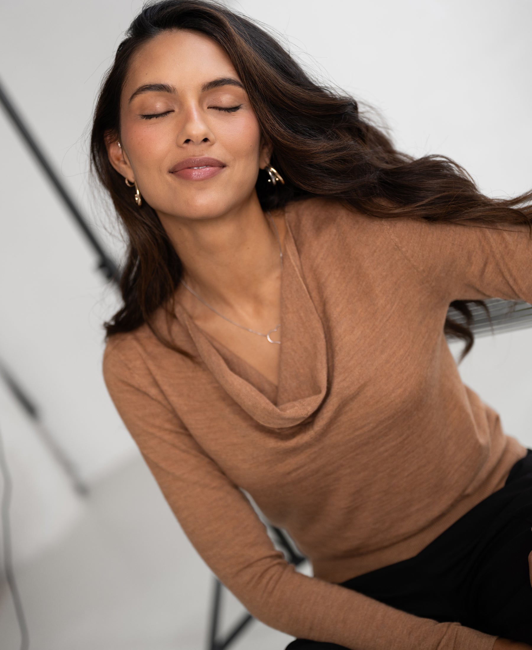 Sweater with waterfall neckline LA CASCADE Chai tea by PLEIN PUBLIQUE shown in a bright studio.