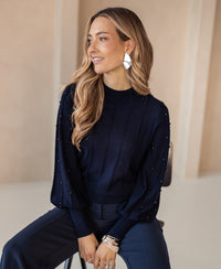 Navy blue PLEIN PUBLIQUE LA CENTAINE turtleneck sweater with beaded details.