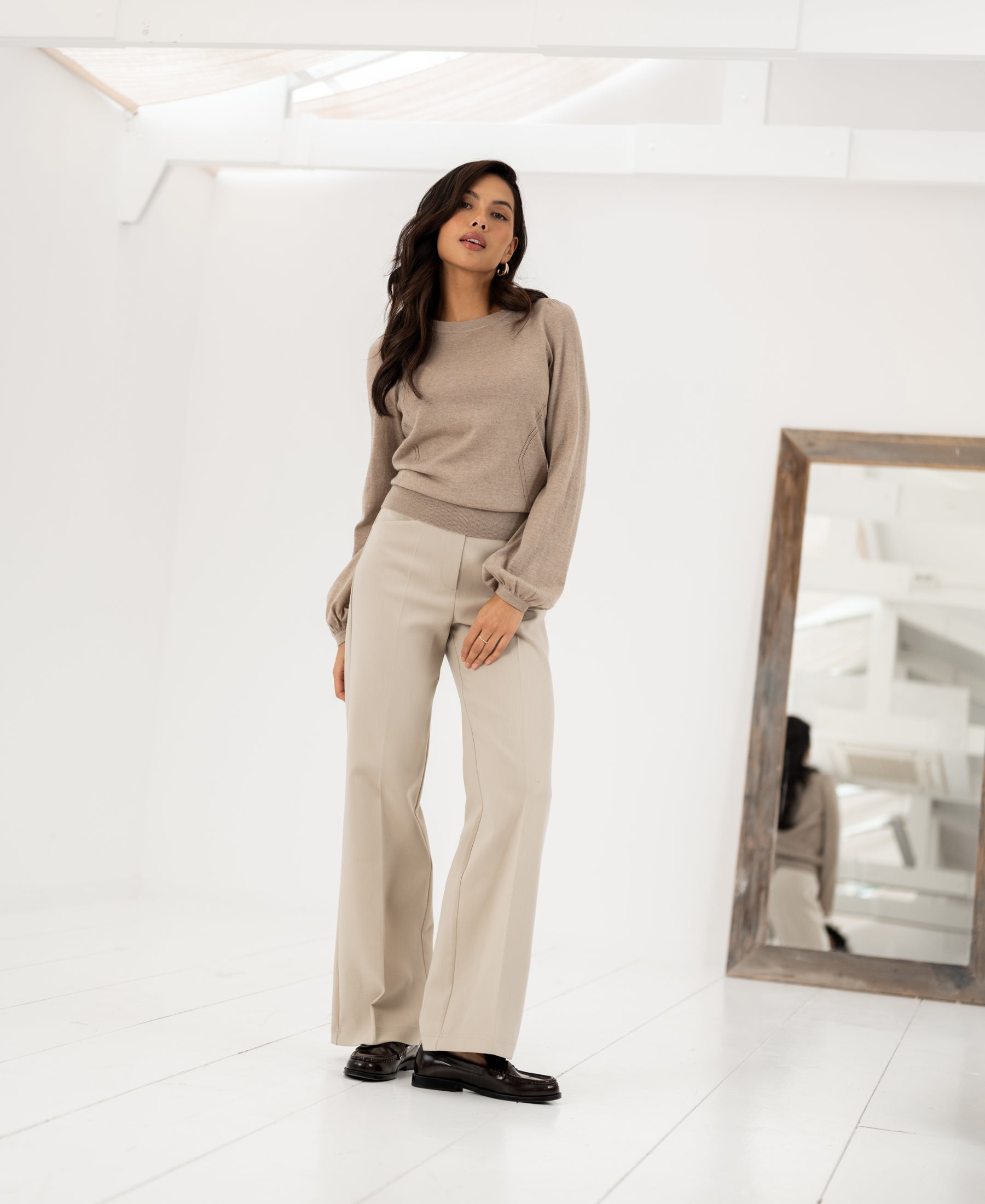A beige PLEIN PUBLIQUE Merino wool sweater, style LA COEUR, shown in sand color.