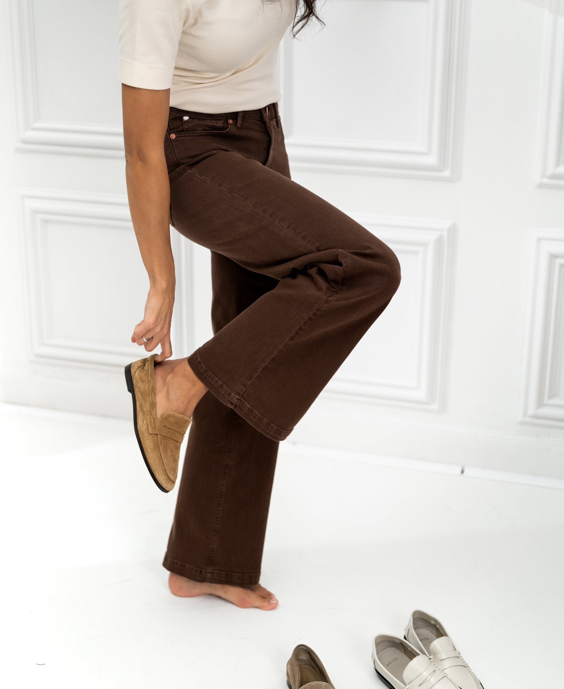 PLEIN PUBLIQUE LES DEUX Cacao brown jeans lying on a white floor.