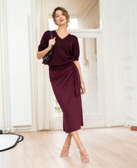 Woman wearing a burgundy PLEIN PUBLIQUE Travel Skirt in Wine.
