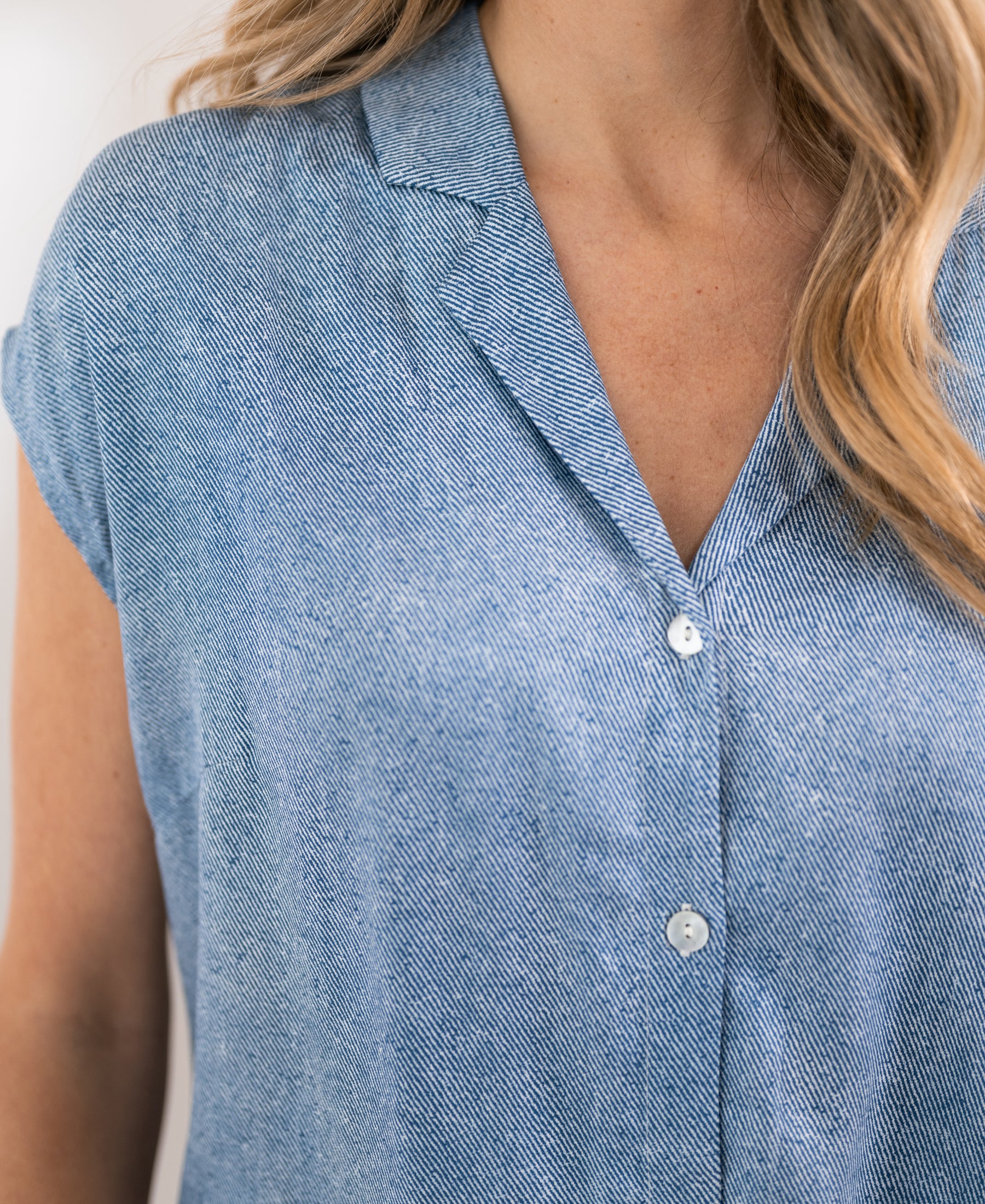 The LA DILOU Jeans Print Blouse by PLEIN PUBLIQUE, shown from shoulder to mid-torso.