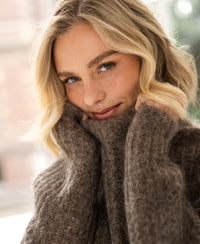 Light brown mohair sweater in a semi-oversized fit.