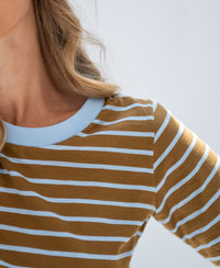 Close-up of PLEIN PUBLIQUE striped T-shirt in gold yellow and light blue.