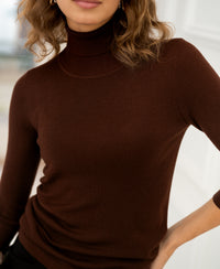 Brown LE FABIAN turtleneck sweater by PLEIN PUBLIQUE, shown from shoulder to waist.