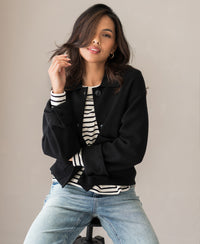 Black wool jacket LA FAYE displayed on a seated woman.
