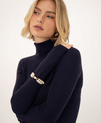 Navy blue merino wool turtleneck sweater by PLEIN PUBLIQUE, front view.