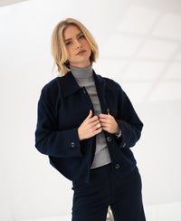 Dark blue wool blazer LA FAYE by PLEIN PUBLIQUE, shown as a stylish in-between-season essential.