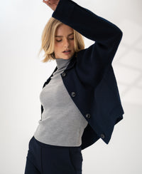 Dark blue wool blazer LA FAYE by PLEIN PUBLIQUE shown against a light background.