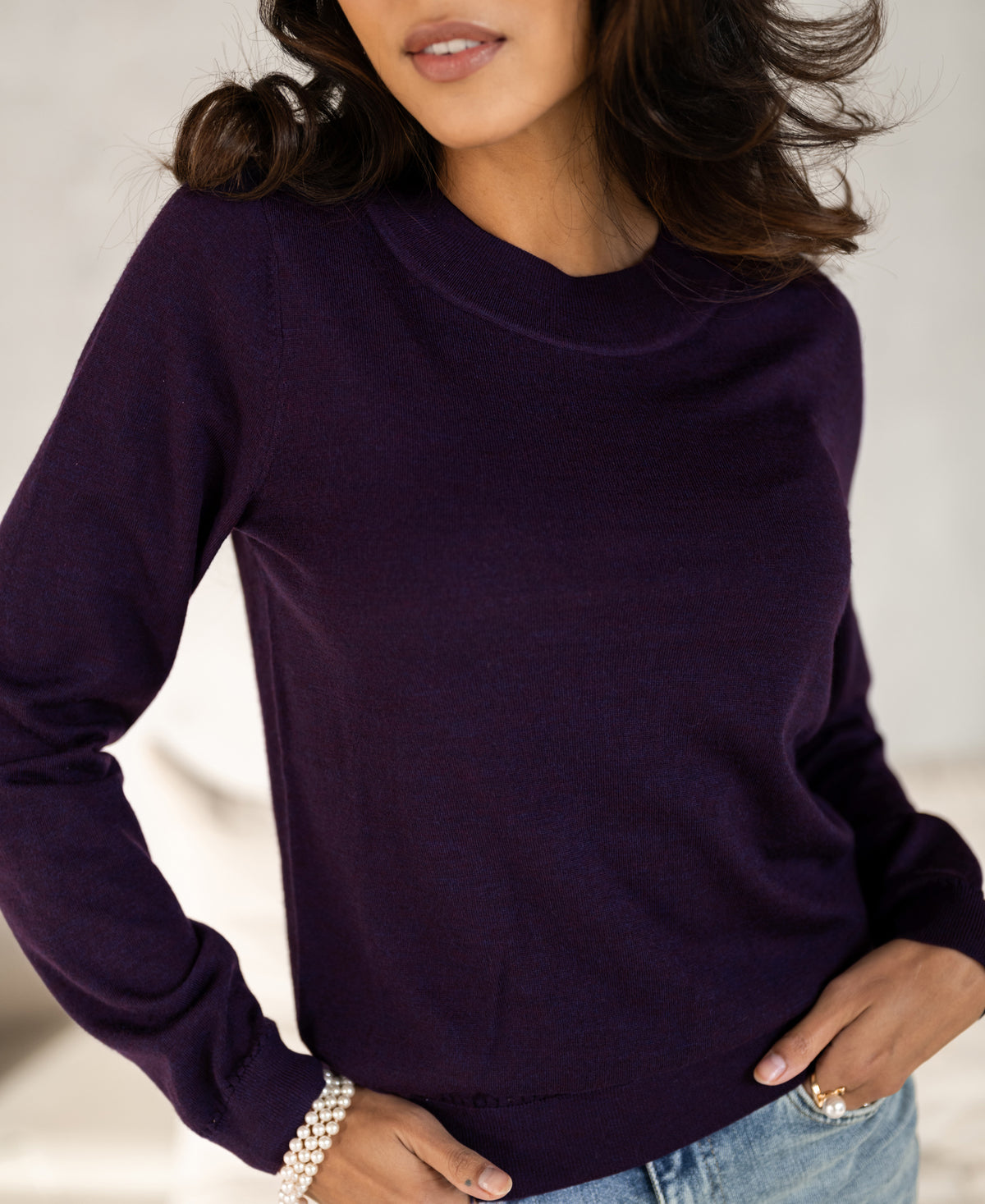 Dark violet merino wool sweater, front view.