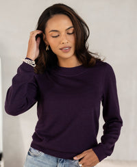 Woman wearing dark violet Merino wool sweater, LA GIGI by PLEIN PUBLIQUE.