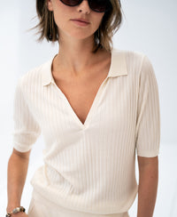 Cream Tencel-silk polo shirt, shown against a light background.