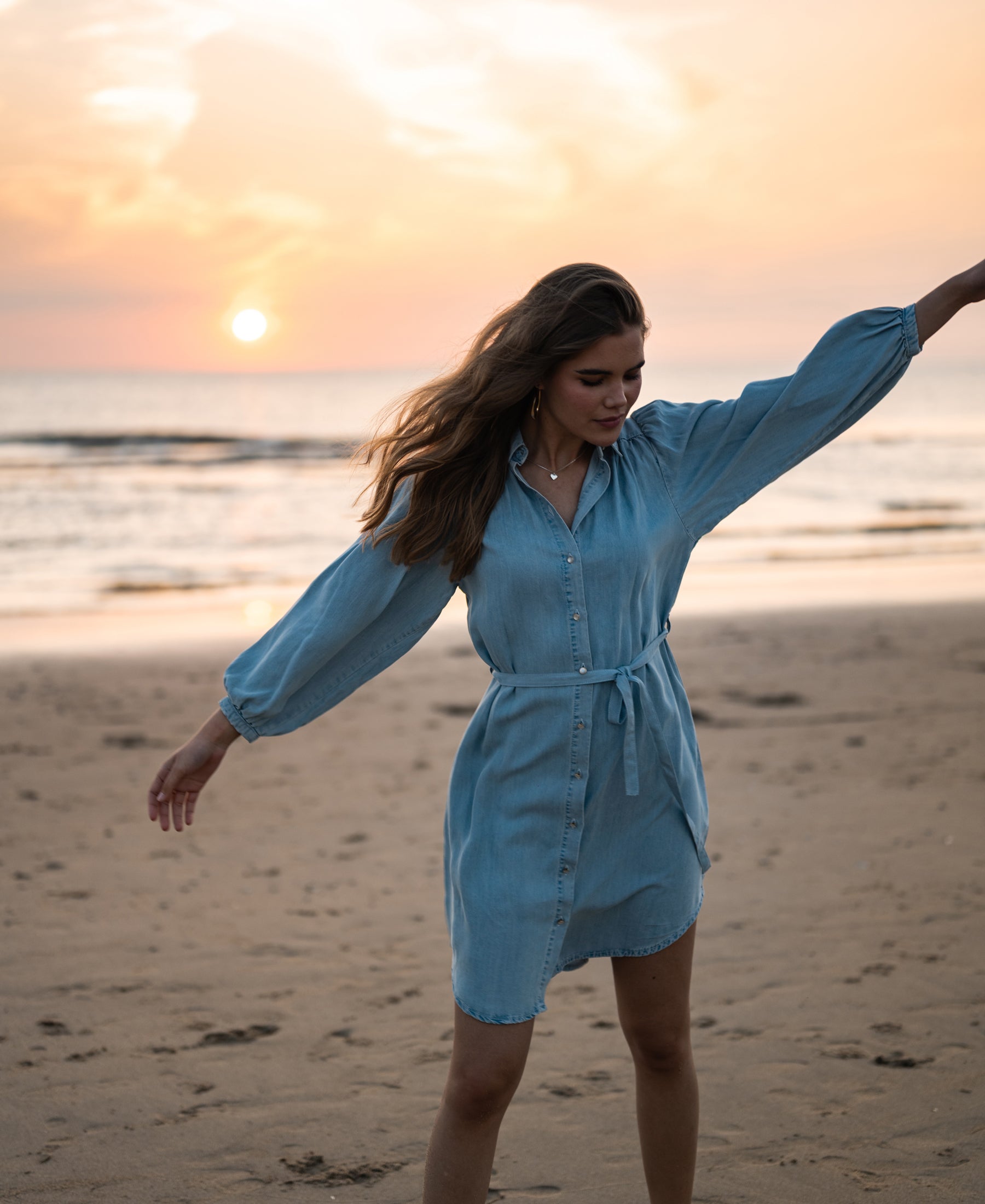 Tencel shirt dress in bleached wash by PLEIN PUBLIQUE, style LA LAVE. Worn outdoors at sunset.