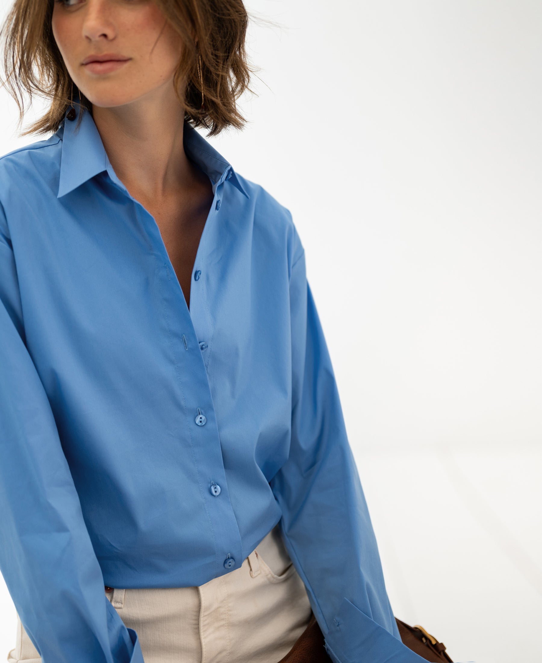 Oversized easy-iron blue blouse in the Lille style shown against a white background.