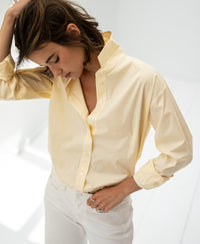 Soft yellow oversized easy-iron blouse shown from the front.