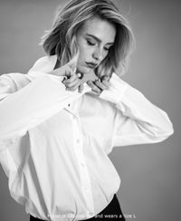 Oversized easy-iron blouse LE LILLE White by PLEIN PUBLIQUE, black and white photo.