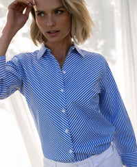 Blue and white striped blouse in soft, natural light.