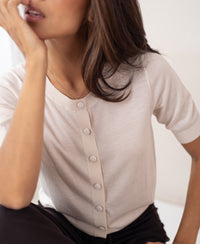 The LA LORAINE Blush merino wool and silk cardigan by PLEIN PUBLIQUE, shown in a front view.