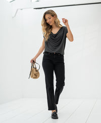 Black cropped 7/8 jeans, shown on a model.