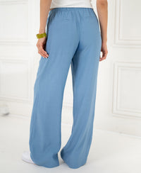 Wide-leg blue LA Lynette jeans with elastic waist, back view.