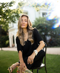 Black silk blend LE MARDY top by PLEIN PUBLIQUE shown outdoors.